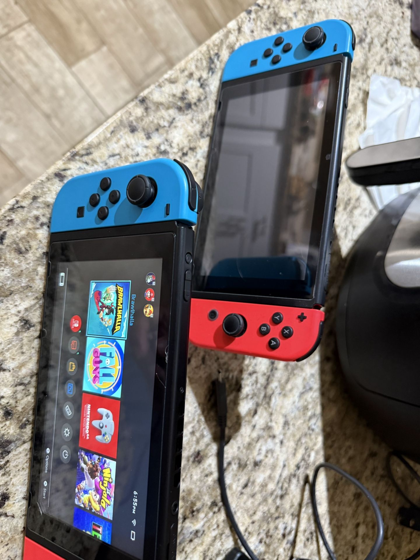 Nintendo Switches (2) Blue/Red Joycons w/Travel Case and Accesories