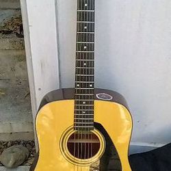 Yamaha Acoustic Guitar With Gig Bag And An Extra Bag
