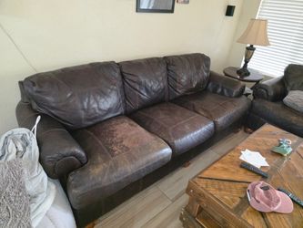 3-Piece Dark Brown Leather Sofa, Loveseat, and Ottoman. End table and lamp. Full living room set