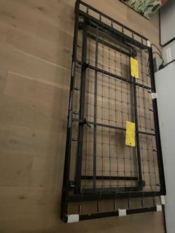 Mental twin size bed frame ( moving sale)