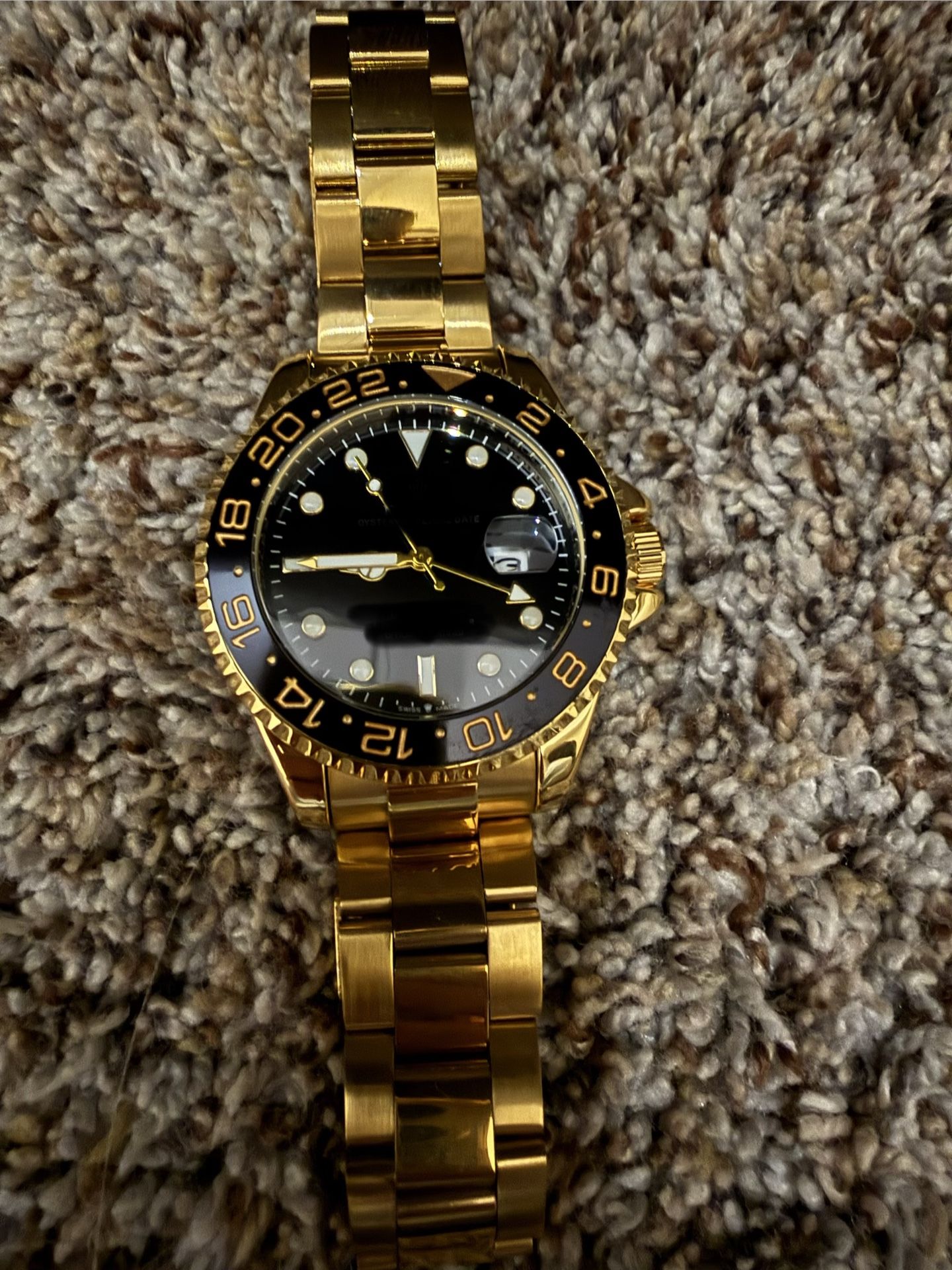 gold and black watch