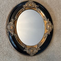 Beautiful Vintage Black and Gold Oval Mirror