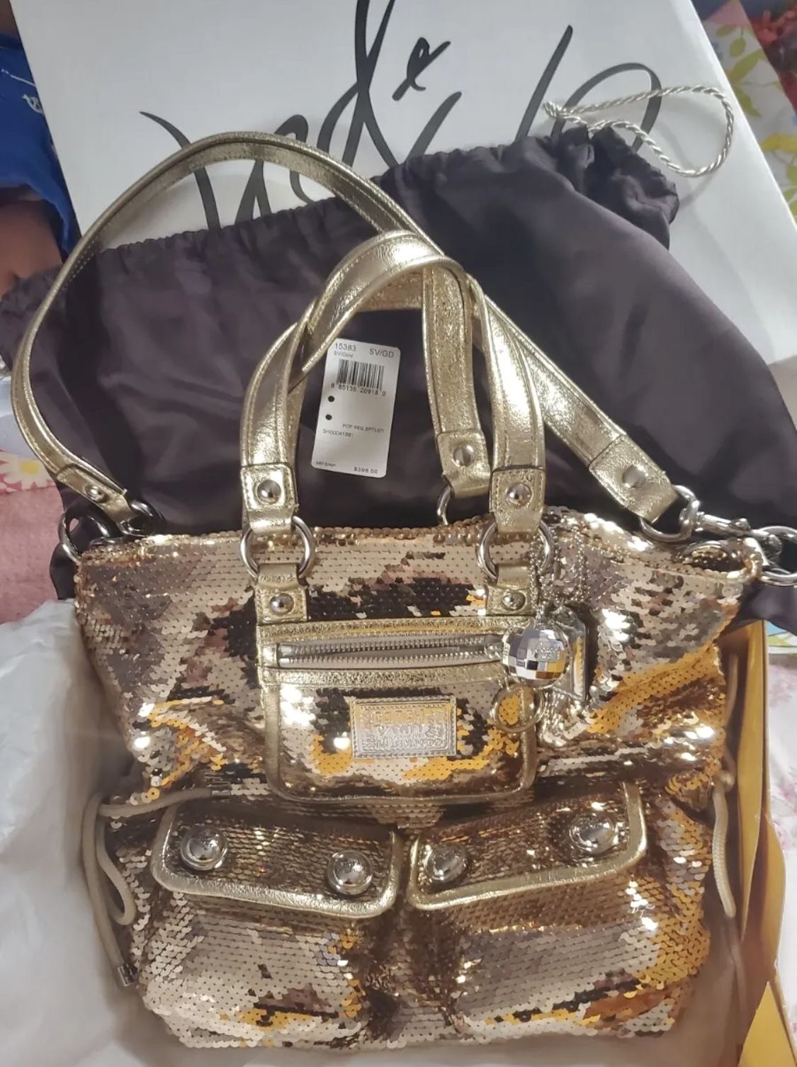 coach sequin tote Cinosural International School