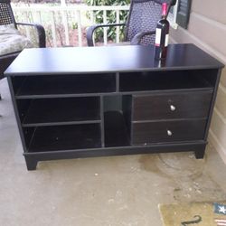 ** WOOD TV STAND WITH STORAGE AND SHELVING** $100