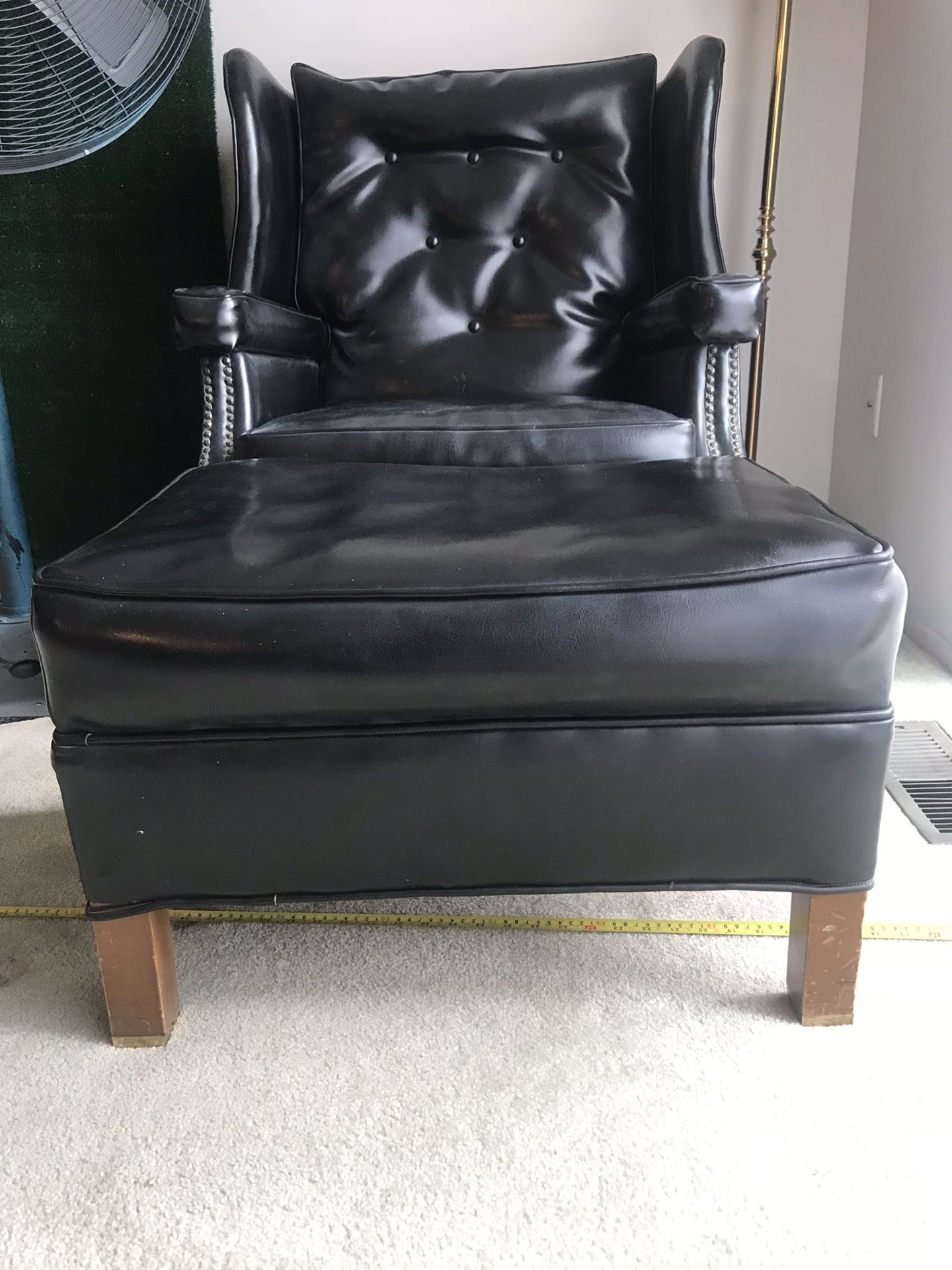 Black leather chair w/ ottoman