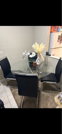 Round Glass Dining Table with 4 Chairs, Sectional Couch, Wall Mirror Decor, Microwave, 50” TV