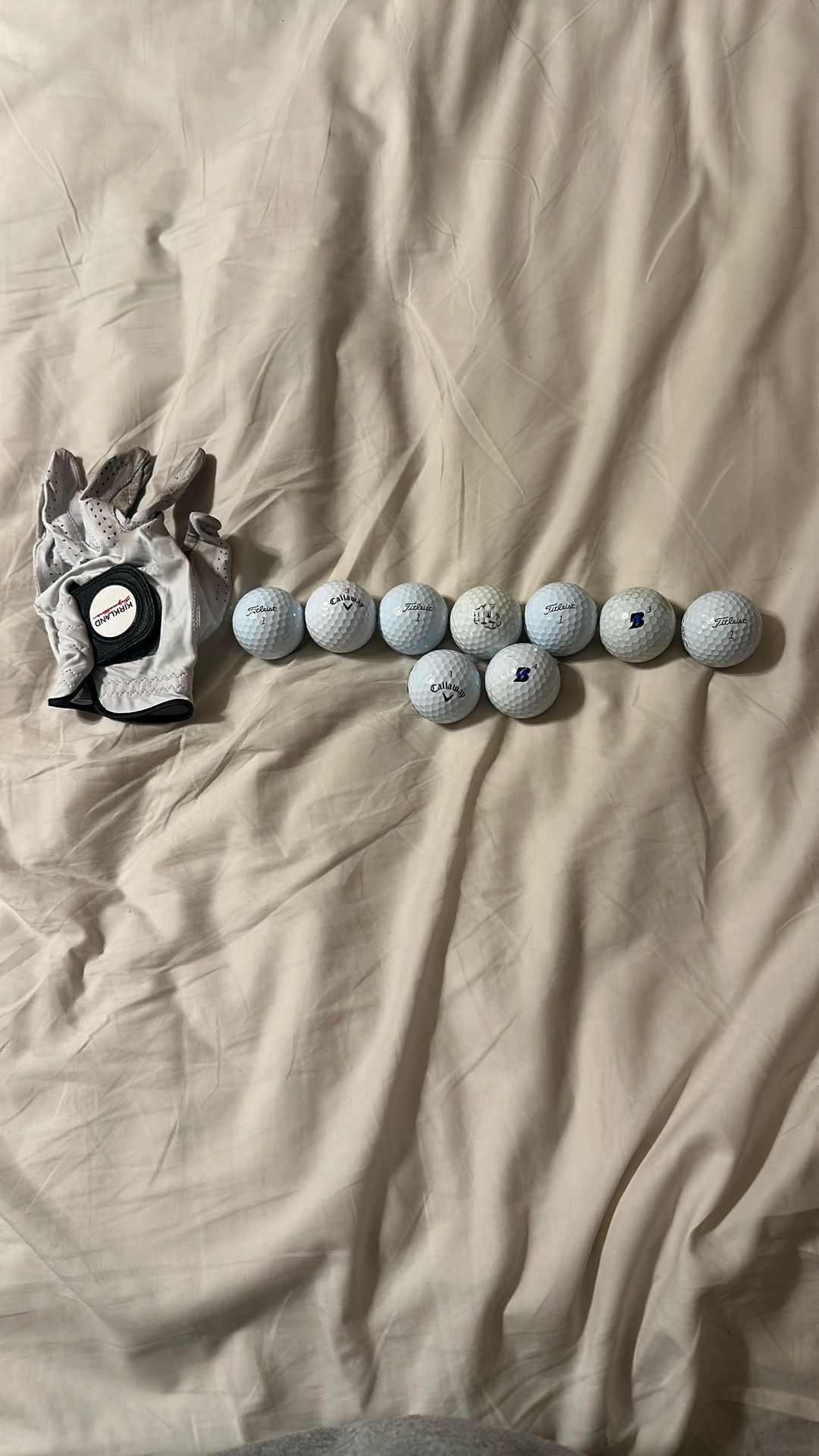 Golf Balls And Used Kirkland Glove