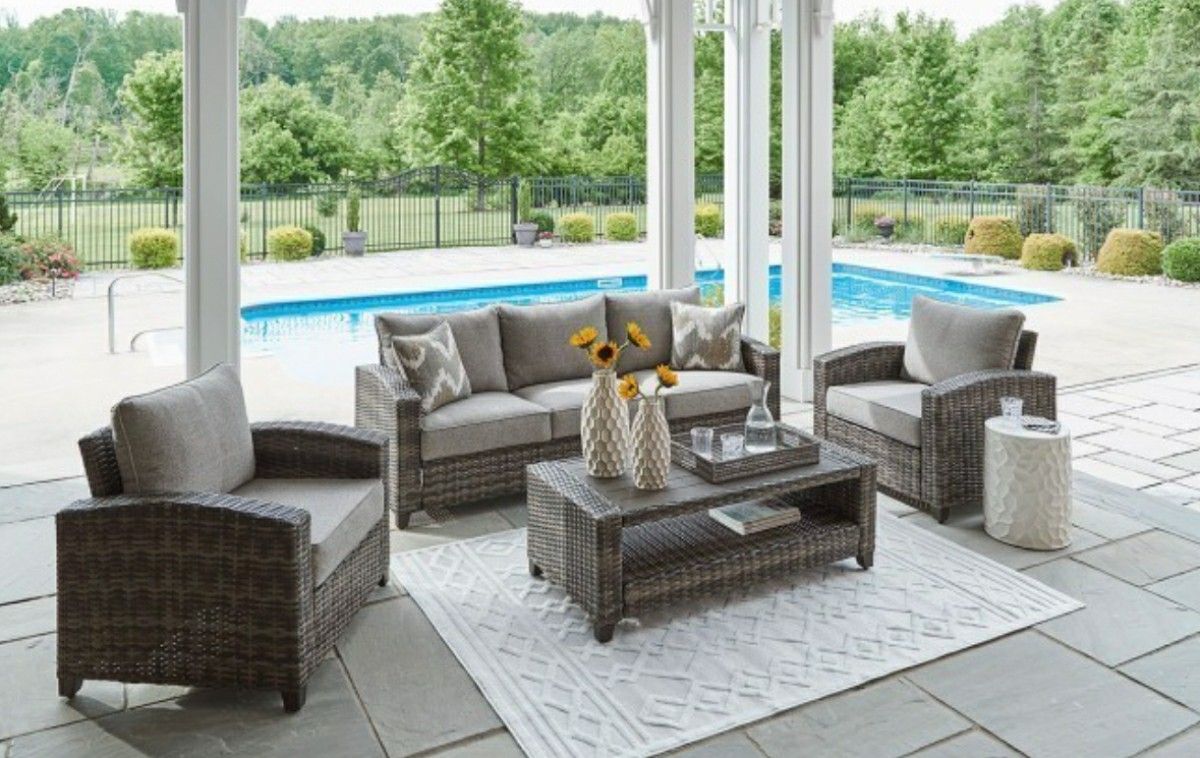 4-Piece Outdoor Wicker Patio Set Sofa, 2 Chairs & Coffee Table!