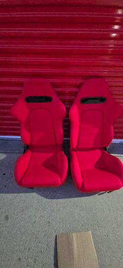 Set of red recliner seat with sliders