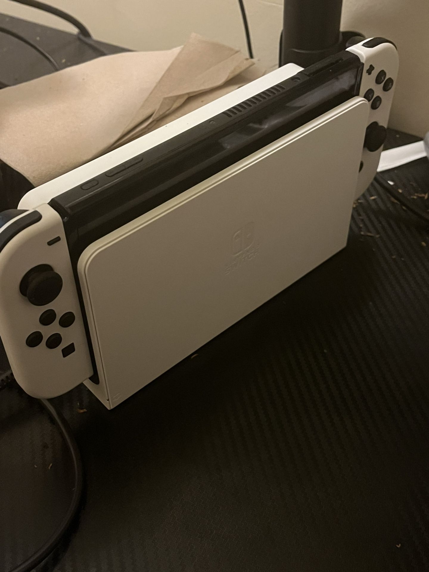 Nintendo switch oled with grip and pro controller