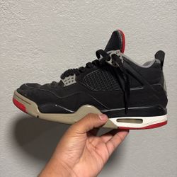 Size 9.5 Jordan 4 Breds 
