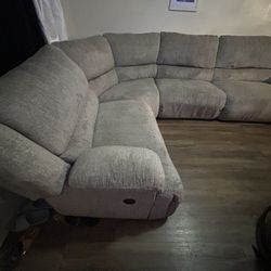 Gray large sectional With Three-Piece Tables At 