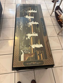 Very nice  oriental coffee table long 48 w 19 H  17