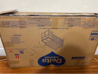 Delta crib with drawers