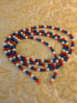 (4) 9 FOOT RED, WHITE & BLUE  BEAD GARLAND