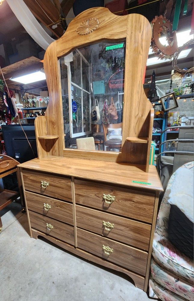 Perdue Dresser with mirror 
6 drawers, still smells like wood!