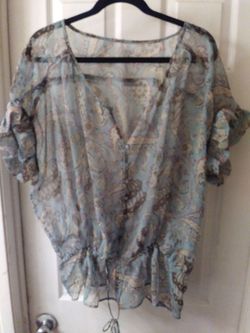 Sheer blouse draw string.