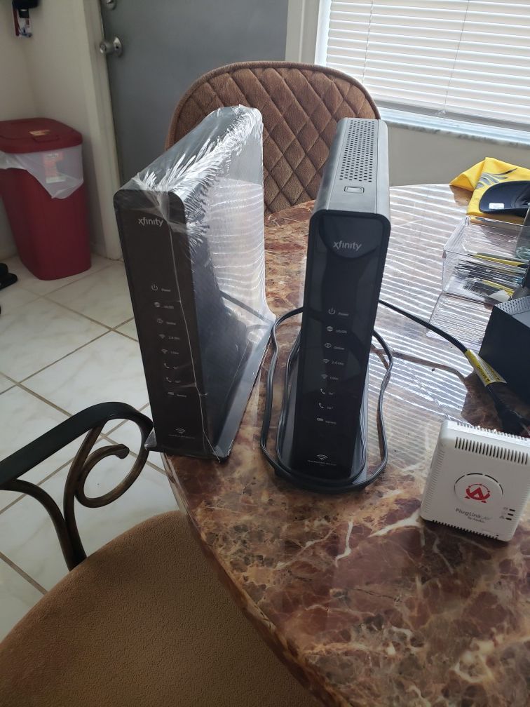 2 comcast modems. Dual band. 1 never used