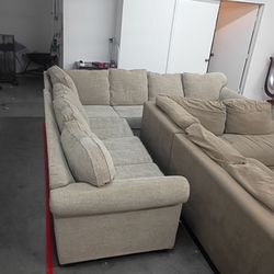 Large 7 seater beige sectional couch