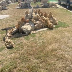 Stone dinosaur sculpture/statue