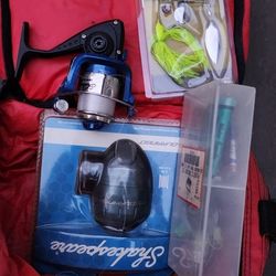 2 Fushing Reels One New. Bunch Of Lures Etc In 2 Bags