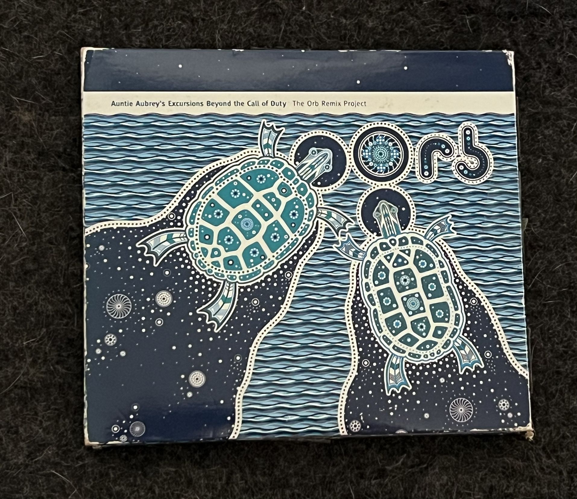 Auntie Aubrey’s Excursions Beyond the Call of Duty The Orb Remix Project CD