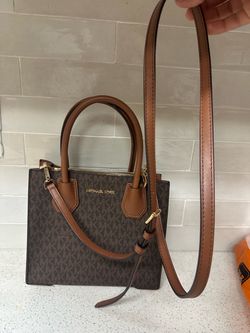MK cross body purse (minor defects as seen on pictures)