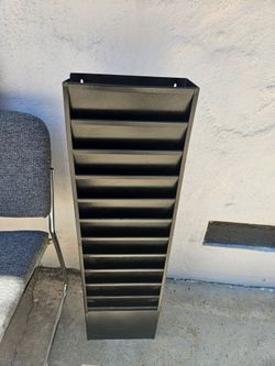 Organizer of metal wall files.