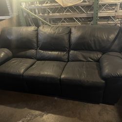 Used Black leather convertible sofa