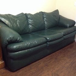 Leather couch, dark green very clean and comfortable, has a small tear hence the great price of $55