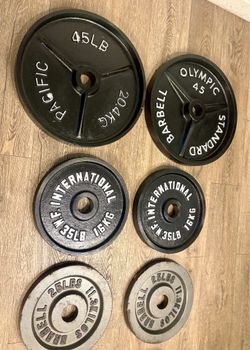 Olympic Full Set Of Cast Iron Weight Plates  from 2.5s to 45s  Pounds Like NEW (reconditioned), [Total: 245 lbs].