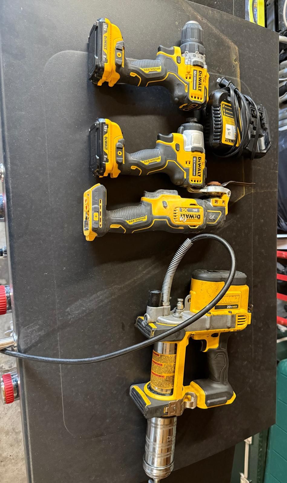 Drill and grease gun set and a multi-tool for sale, all for $330