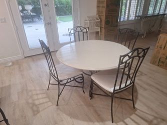 Round White Dining Table with 4 Wrought-Iron Chairs