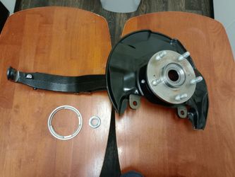 New Front left/driver side wheel hub bearing and steering knuckle assembly