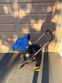 Doona + Car Seat & Stroller+ base (firm price)