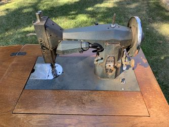 Kenmore sewing machine with cabinet