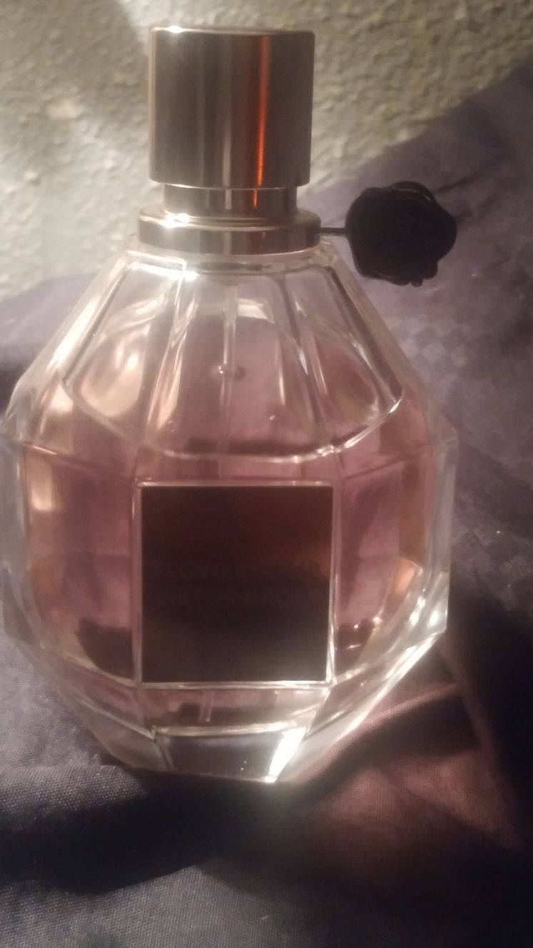 Perfume flower bomb by: Victor & Rolf 3.4 oz barley used, new