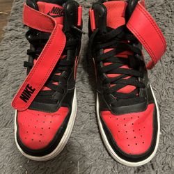 Black and red Nikes