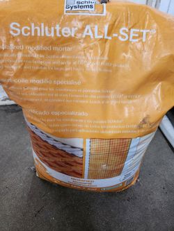FREE - 1/2 bag of Schluter All-Set Modified Mortar for Tile