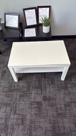 White Coffee Table With Two Sides Pealing A Little Sold As Is