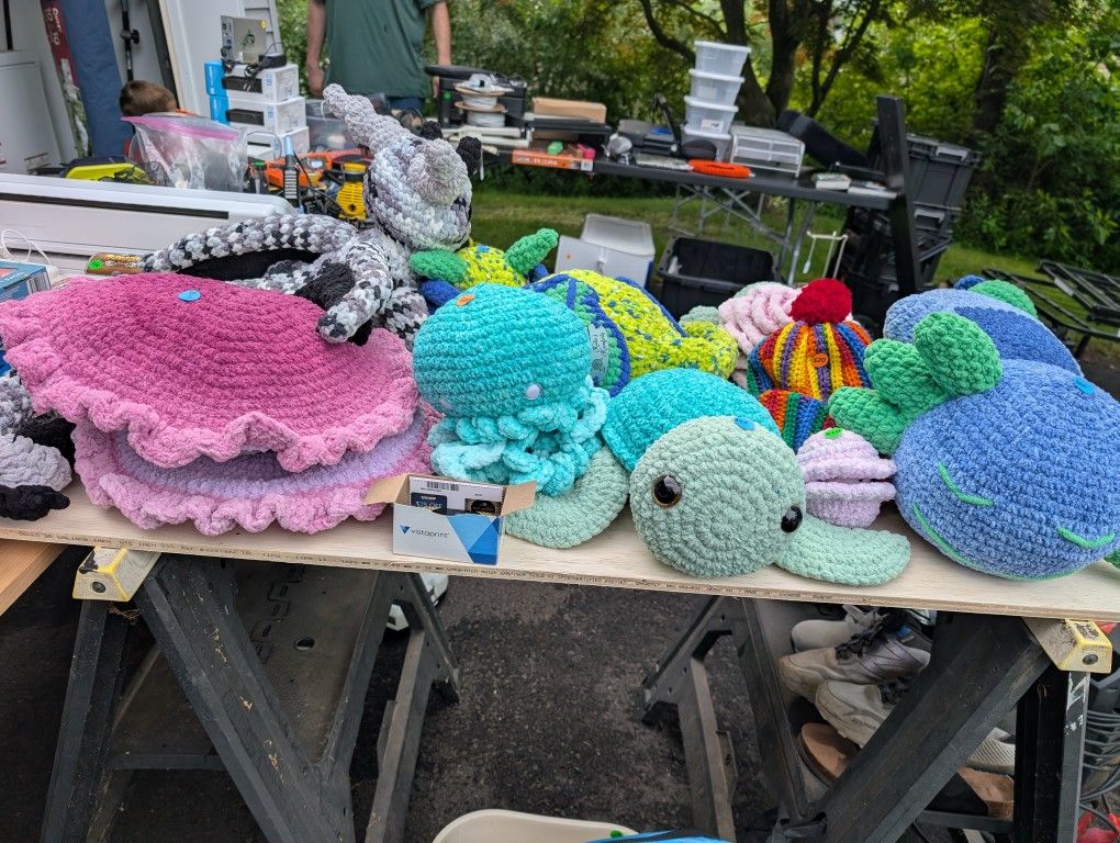 Various crocheted stuffed animals