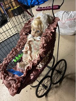 Doll and old Buggy