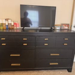 Black dresser with Gold handles 