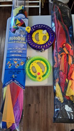 Kites and kite string reel winders