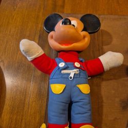 Mickey mouse learned to dress doll and sylvester the cat
