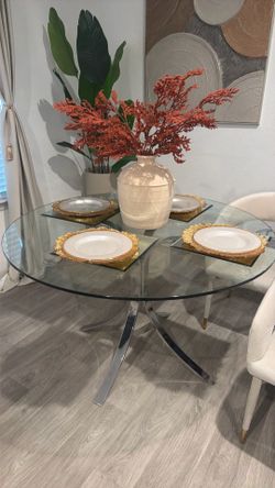 Table and 4 chairs and plates
