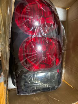 Brand New Aftermarket Tail Light Assembly Red Lens