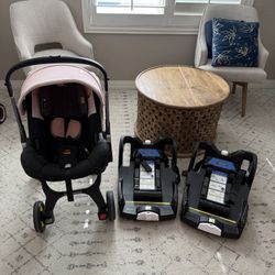 Pink Doona Car Seat Stroller + 2 Bases