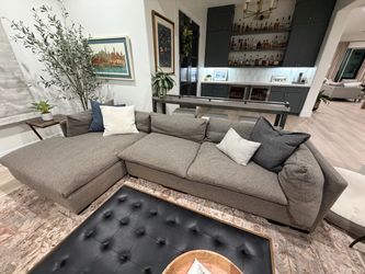 Dark grey couch with chase