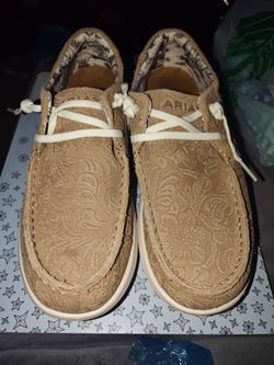 Women's Ariat slip on shoes.